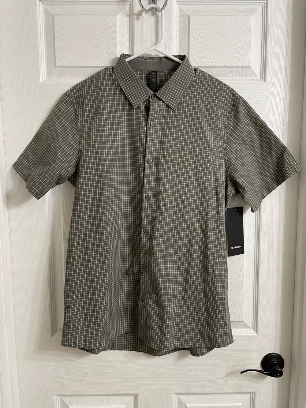 lululemon athletica grid light ss shirt men’s large with hidden reflective strip